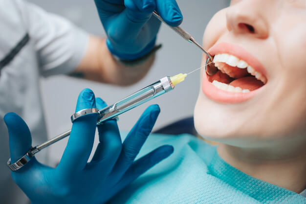 anestesia dentaria dentista anestesiando a paciente