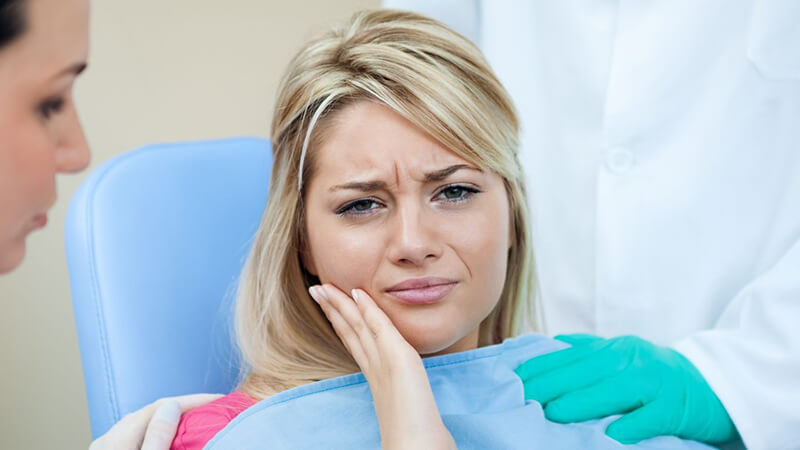 home care odontológico mulher com dor de dente